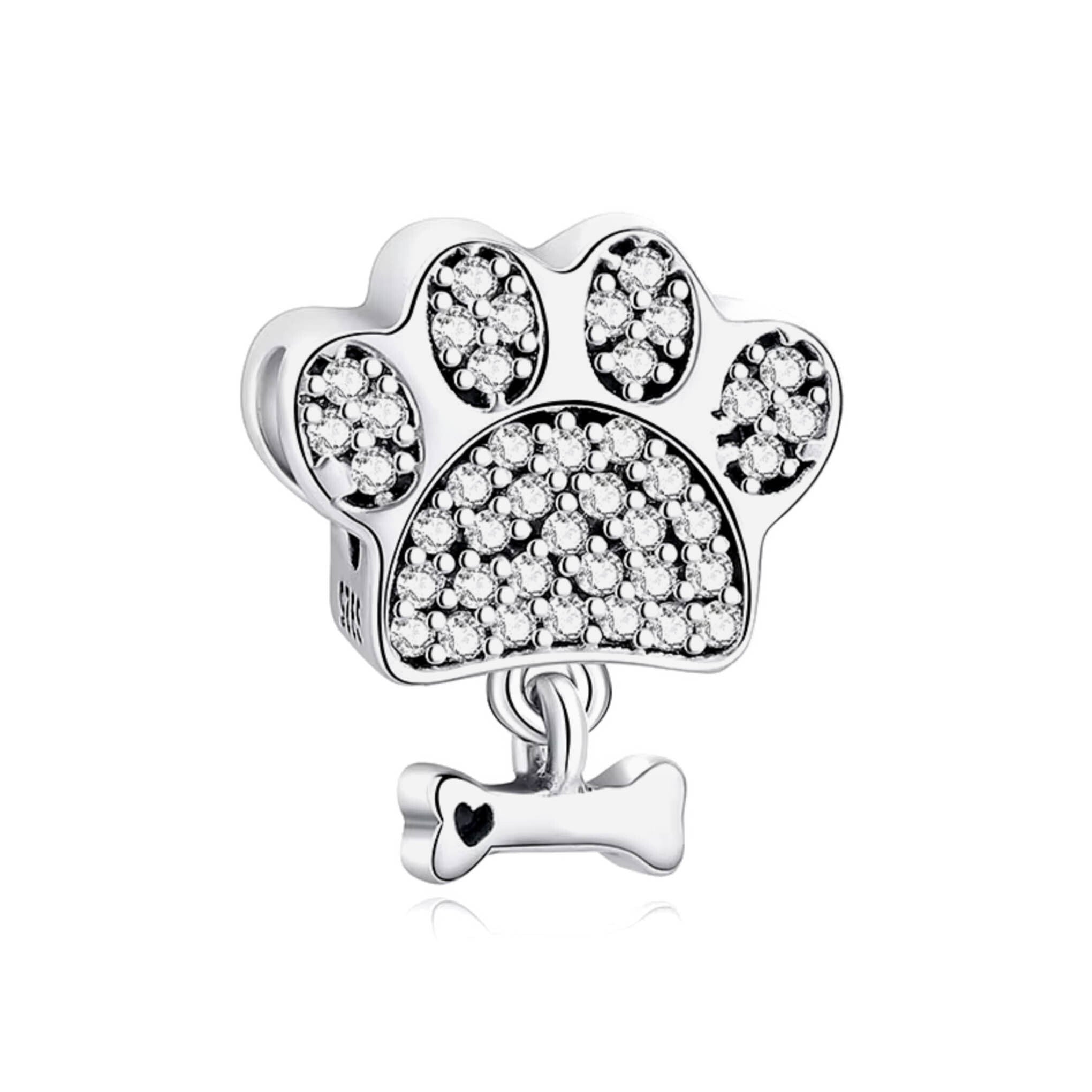 Dije con chapa de plata tipo charm huellita de perrito con zirconia y huesito de plata mexicana