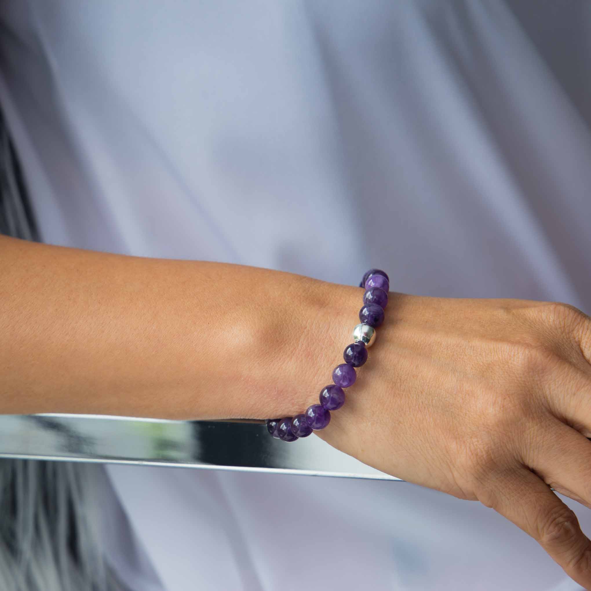 Pulsera esferas de piedras amatista con plata